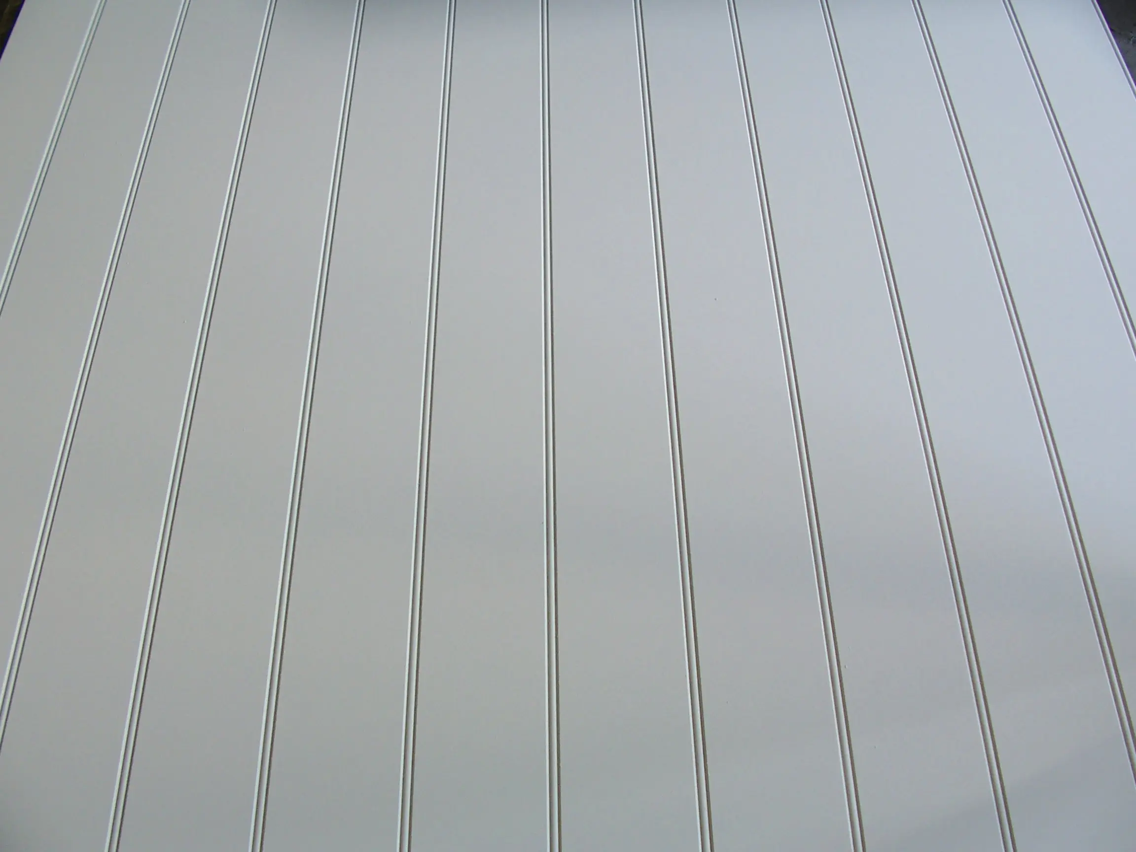 Product image for 9mm X 1215mm X 2440mm Primed Long Grooved MDF Panel