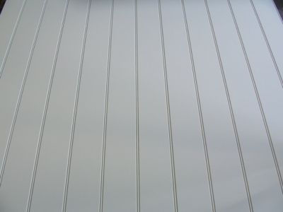 Product image for 9mm X 1220mm X 2440mm Primed Short Grooved MDF Panel